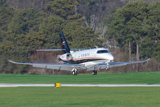 Cessna Citation Sovereign (N8JR) - Dale Earnhardt Jr's plane landing in Atlanta on Superbowl LIII weekend. Questions about this photo can be sent to Info@FlewShots.com