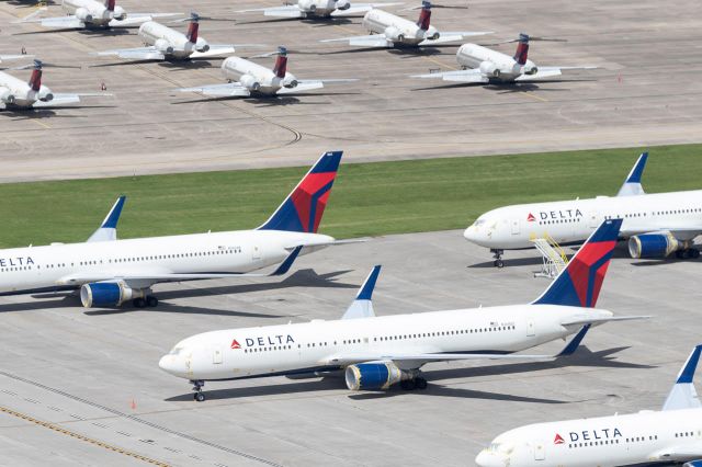 — — - Delta 767s and 717s stored at Wilmington Air Park.