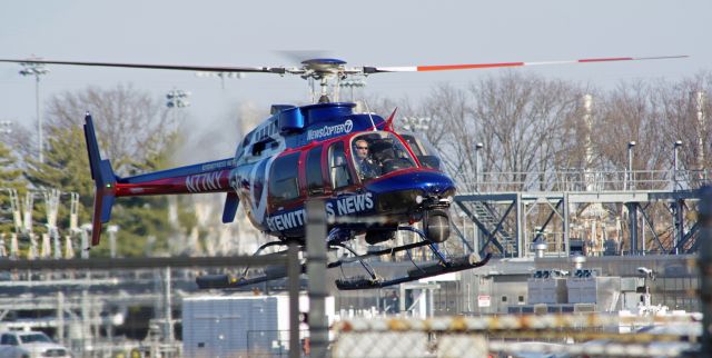 Bell 407 (N77NY) - LINDEN AIRPORT-LINDEN, NEW JERSEY, USA-FEBRUARY 08, 2023: A news helicopter from one of the local New York City television stations is seen by RF preparing to land at approximately 1458 hours.