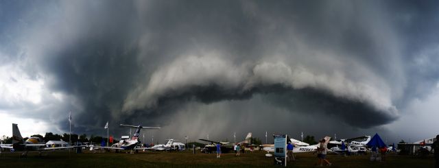— — - A storm rolls in at the 2012 EAA Airventure