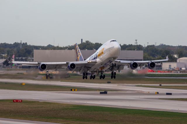 Boeing 747-400 (N480MC) - GTI8055 taking off 21R bound for Baltimore with the Baltimore Ravens onboard.