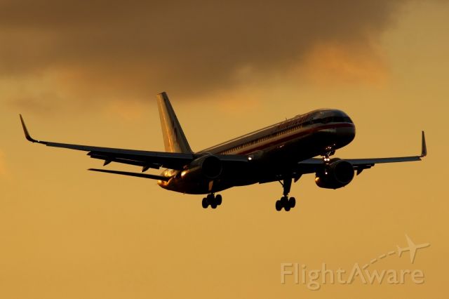 Boeing 757-200 (N197AN) - Check out our aviation videos with 100% authentic and non-leveled sound! a rel=nofollow href=http://youtube.com/ilikeriohttps://youtube.com/ilikerio/abr /br /Short final to 9 at sunset. 10/12/14