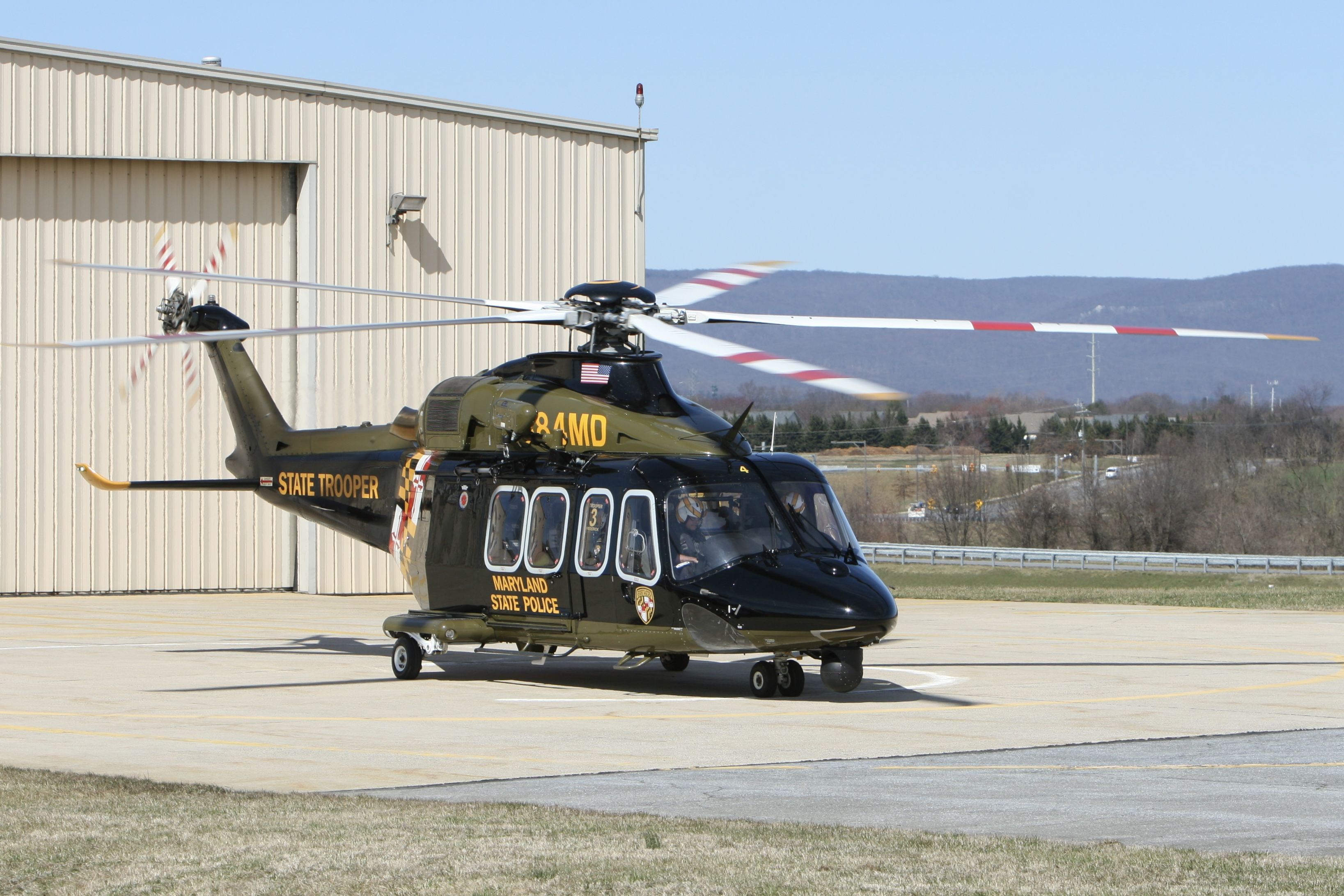 BELL-AGUSTA AB-139 (N384MD) - March 19, 2021 - parks in front of hangar 