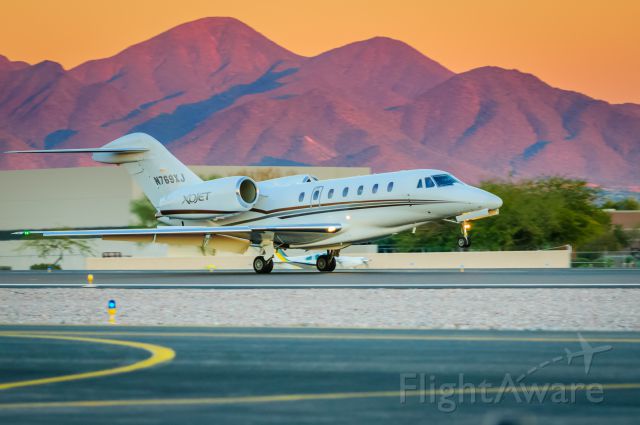 Cessna Citation X (N769XJ) - This is what a beautiful Arizona sunset looks like. An XO Jet Cessna Citation X rolls out after touching down on Scottsdales Runway 21. br /br /Please vote if you like my work! Thank you!br /br /©Bo Ryan Photography | a rel=nofollow href=http://www.facebook.com/boryanphotowww.facebook.com/boryanphoto/a
