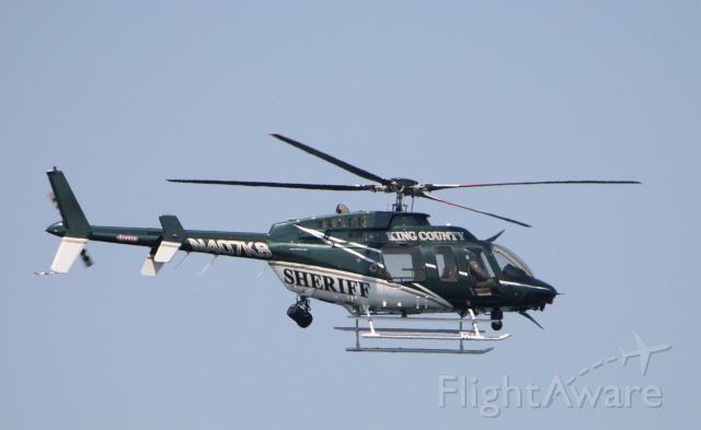 Bell 407 (N407KS) - King County Sheriffs Dept helo flying over Elliott Bay 7-29-09 during the US Navy fleet arrival.