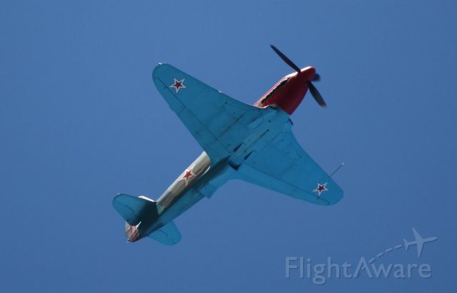 YAKOVLEV Yak-3 (ZK-YYY) - YAK-3 doing areobatics above Long Bay Regional Park