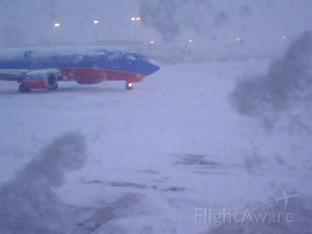 Boeing 737-700 — - Salt Lake City snow storm, waiting to De-ice