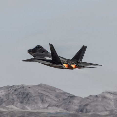 Lockheed F-22 Raptor — - Blasting out of Nellis AFB.