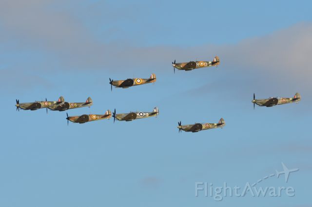MULTIPLE — - Seven Spitfires and one Seafire at Duxford Air Show on 19 September 2015.br /Clockwise from the top: Mk 1. Mk IXT, Mk IXT, LFIII (Seafire), Mk 1, Mk XVI (part obscured), Mk IX, MK 1.