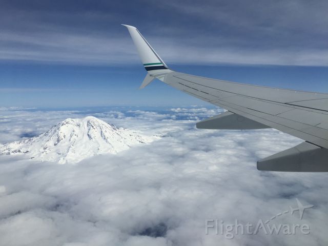 Boeing 737-900 — - Departing KSEA with a beautiful view of Mt.Rainier.