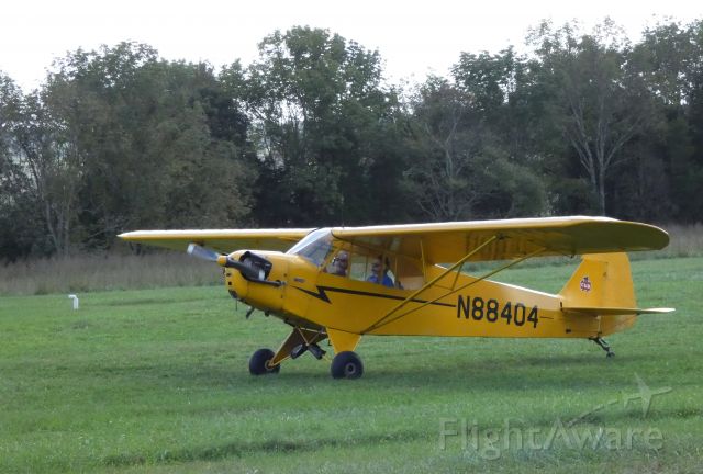 Piper NE Cub (N88404) - A moment after landing is this 1946 Piper J3C-65 Cub in the Summer of 2018.