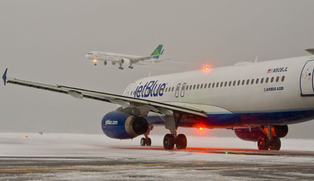 Boeing 757-200 (EI-LBR) - New B757 service to Logan Airport from Shannon landing in heavy snow on 02.13.14