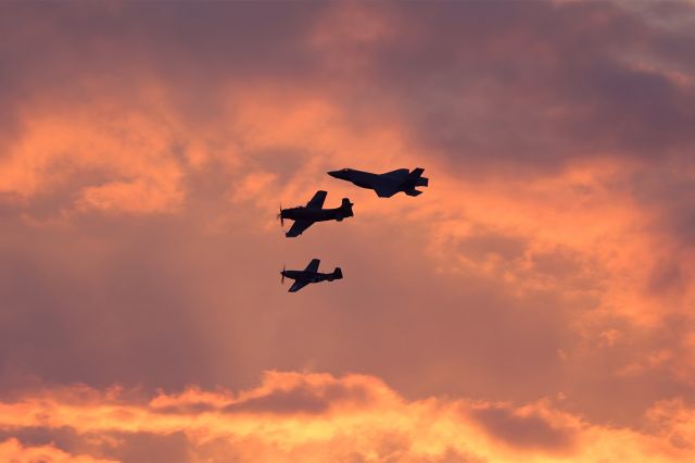 Lockheed F-35C (18-5452) - The USAF Heritage Flight amidst a beautiful evening sky with a Douglas EA-1A Skyraider “Bad News”, a North American P-51D Mustang “Happy Jacks Go Buggy” and F-35A Lightning II at the EAA Twilight Flight Fest, 27 Jul 2022.