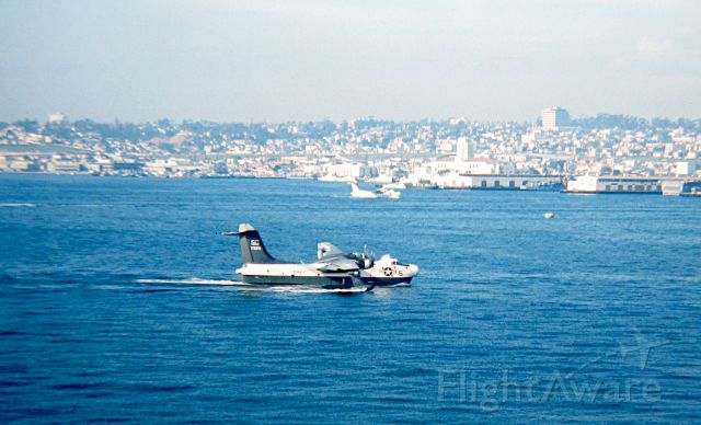 — — - An SP-5B of the VP-50 "Blue Dragons" based at NAS North Island taxis in San Diego Bay.  Taken from the fantail of the USS Kitty Hawk 1967.  I remember they would start the takeoff run from midway between North Island and San Diego and be almost out of sight by Point Loma before they slowly lifted off.