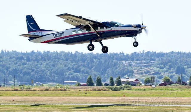 Cessna Caravan (N9655B) - Skydive Snohomish's Cessna Caravan takes off from Harvey Field in Snohomish, WA