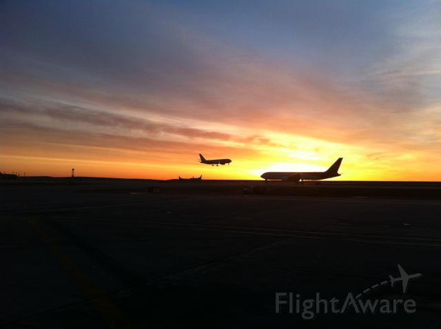 BOEING 767-300 — - Sunrise at DIA means the end of my day. UPS 767 ready leave and a DHL 767 landing.