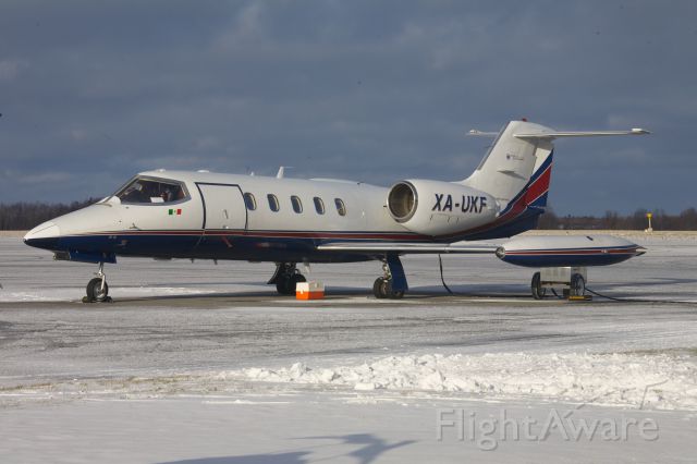 Learjet 35 (XA-UKF) - An uncommon visitor to Kingston - a Mexican registered Learjet 35...