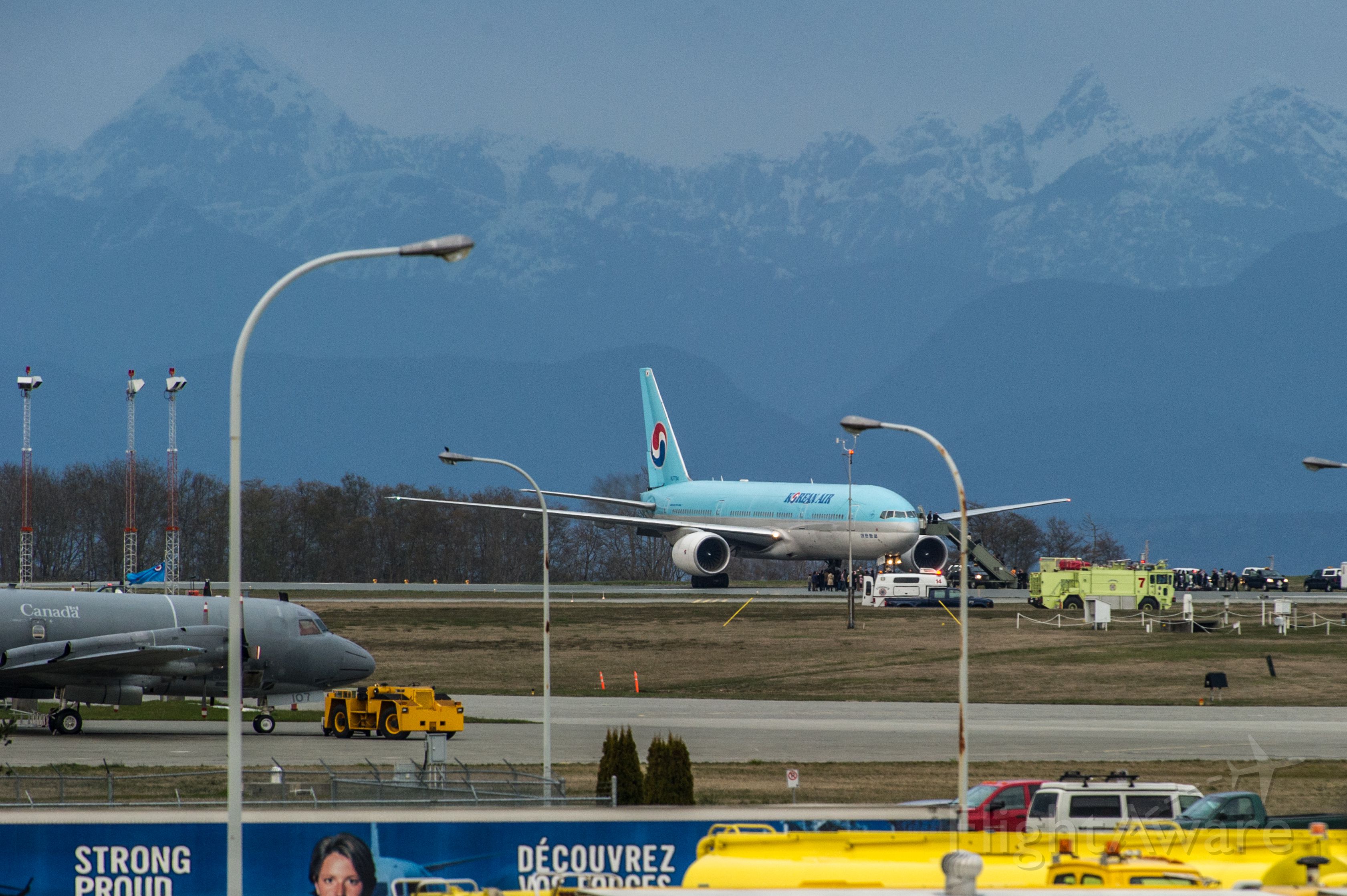 Boeing 777-200 (HL7734) - KAL Flight 72 lands at CFB Comox as a result of a bomb threat.