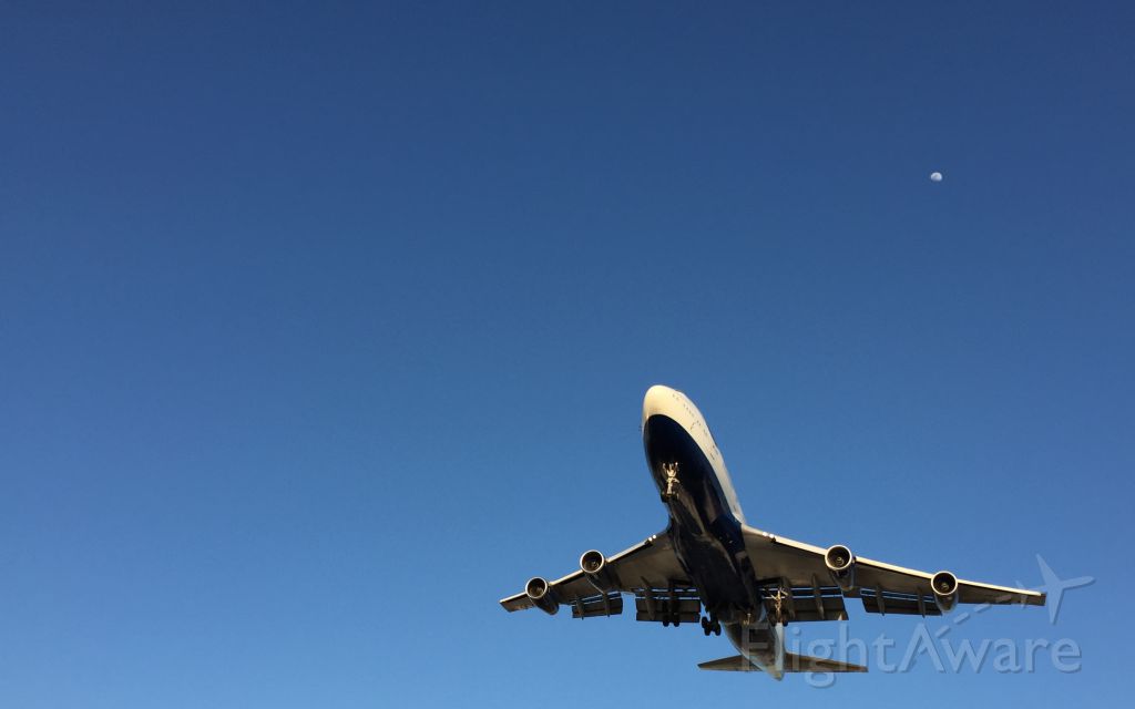 Boeing 747-200 — - iPhone photo! Glad the moon came out in the photo.