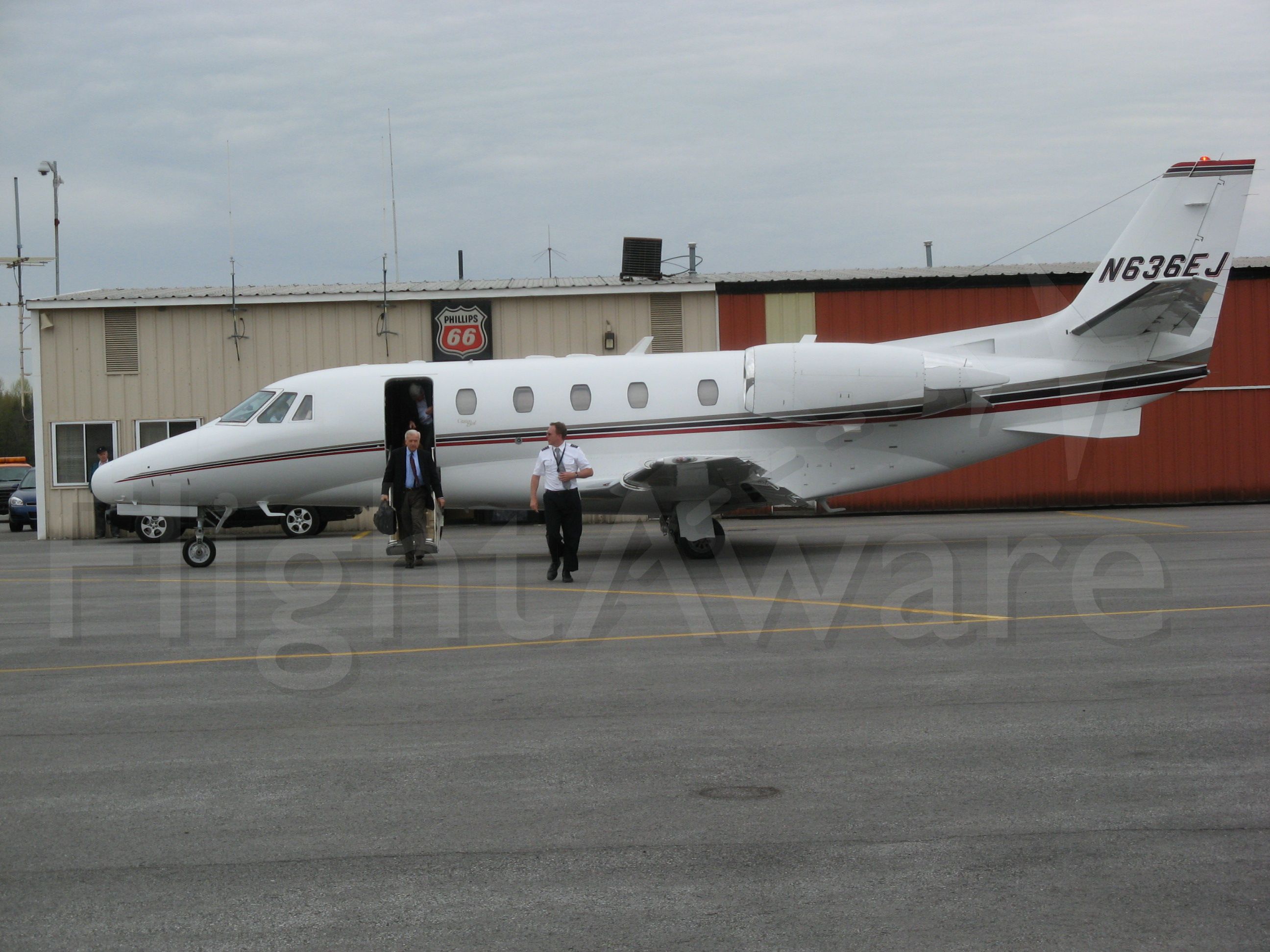 Cessna Citation Excel/XLS (N636EJ) - 2002 CESSNA CITATION EXCEL unloading passengers at Oswego County NY Airport(KFZY) on 5/5/09.