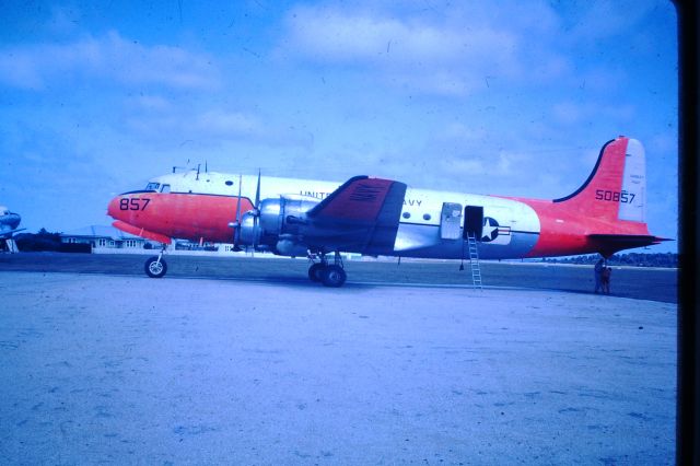 Douglas C-54 Skymaster (50-8857) - US Navy C54 at Flinders Island after flying in a new engine for stranded DC3, circa 1964