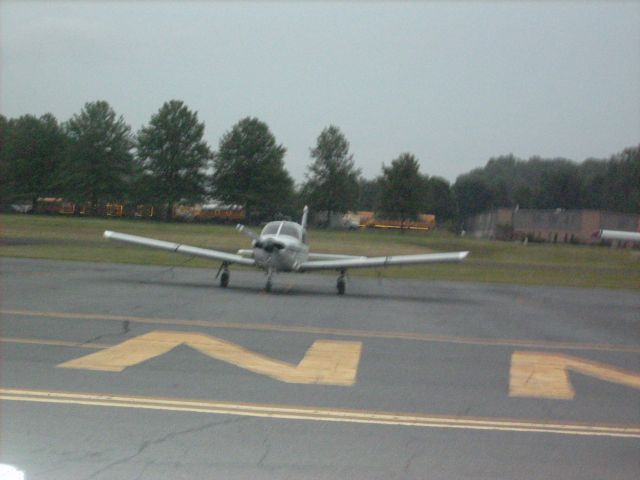 Piper Cherokee — - A blurry picture of a rental plane sitting on the ramp at the Doylestown Airport in Pennsylvania. This picture was taken at night.