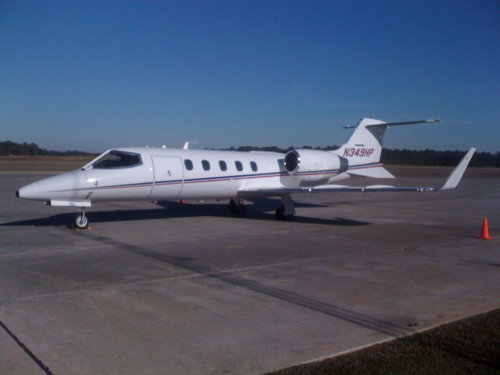 Learjet 31 (N349HP) - On the ramp at KHEZ