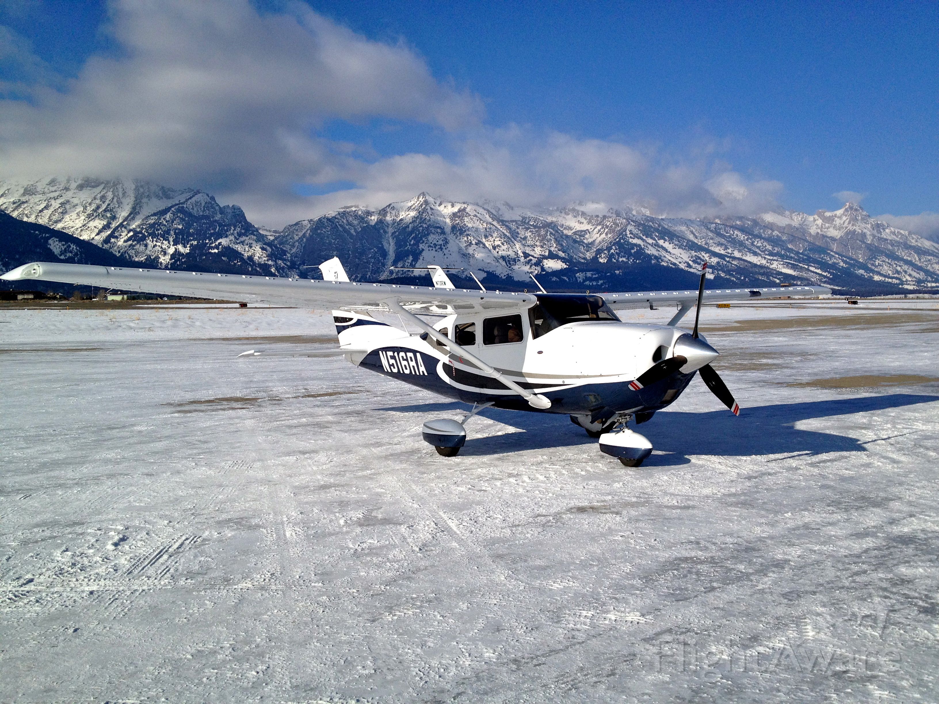 Cessna 206 Stationair (N516RA) - Jackson Wyo Grand Tetons in the background