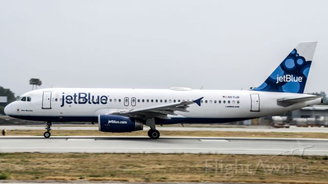 Airbus A320 (N571JB) - A JetBlue A320 rolling down RWY 30 at LGB for a short hop to Oakland 