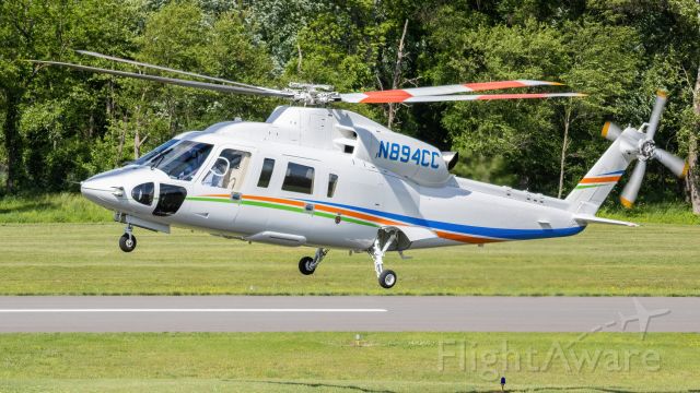 Sikorsky S-76 (N894CC) - N894CC touching down on the taxiway at College Park Airport 