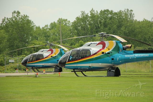 Eurocopter AS-350 AStar (C-GTZN) - 6/19/19 EC AS350 C-GTZN and C=GTZP parked at the hanger