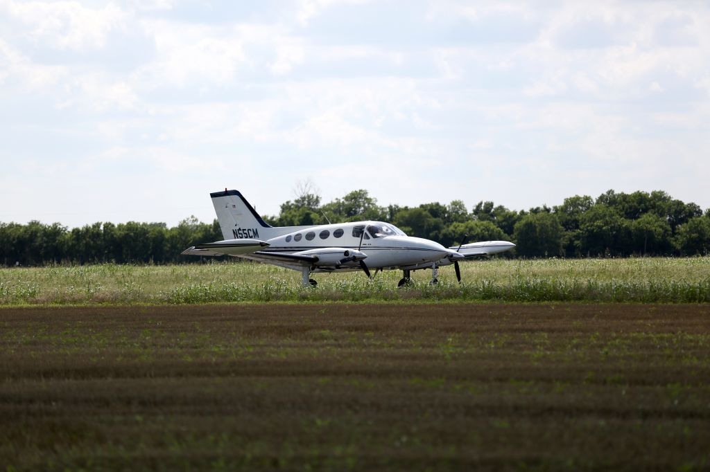 Cessna Chancellor (N55CM) - Our plane taxiing after landing from the north.