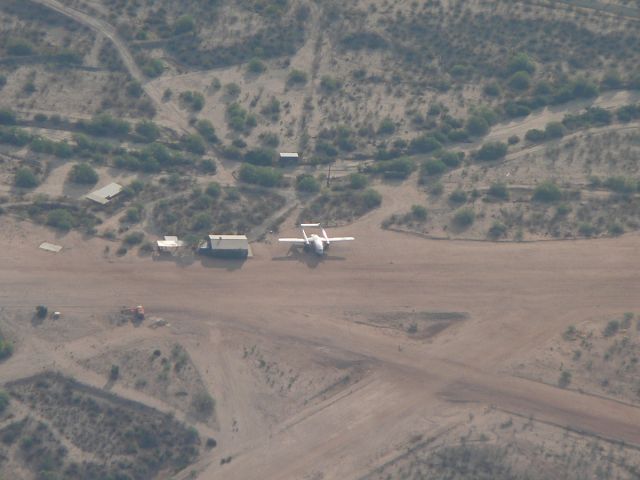 FAIRCHILD (1) Flying Boxcar (N15501) - The Flight of the Phoenix C-119 seen while enroute KPHX-KVGT. Photo taken from about 7,000 ft.