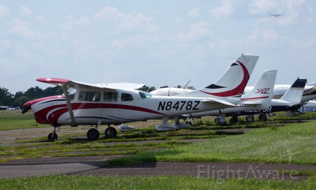 Cessna 205 (N8478Z) - Catching some tarmac time with it's friends is this 1963 Cessna 210-5 (205A) in the Summer of 2019.