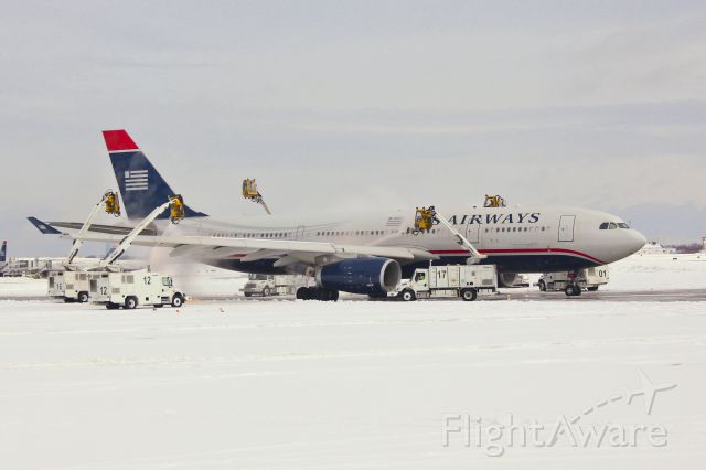 Airbus A330-200 (N286AY) - De-iceing after the Feb 13th snow storm