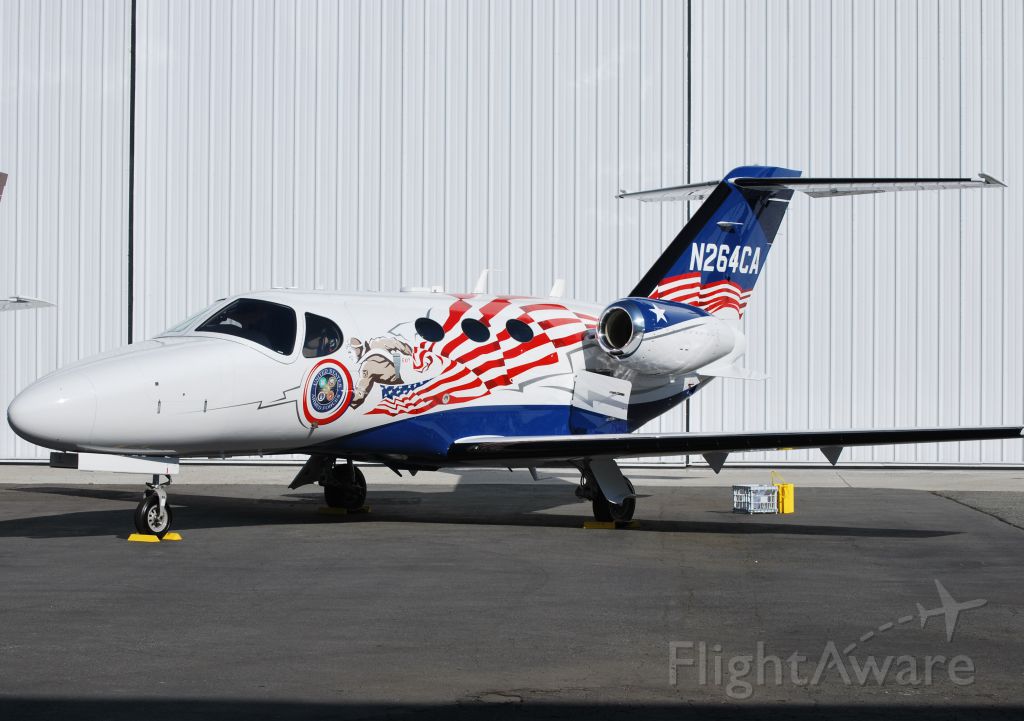 Cessna Citation Mustang (N264CA) - CESSNA AIRCRAFT CO at KJQF for the announcement that Cessna Aircraft/Textron will be sponsoring Earnhardt Ganassi Racing driver, Jamie McMurray, during the NASCAR Sprint Cup Series in 2013 - 1/23/13
