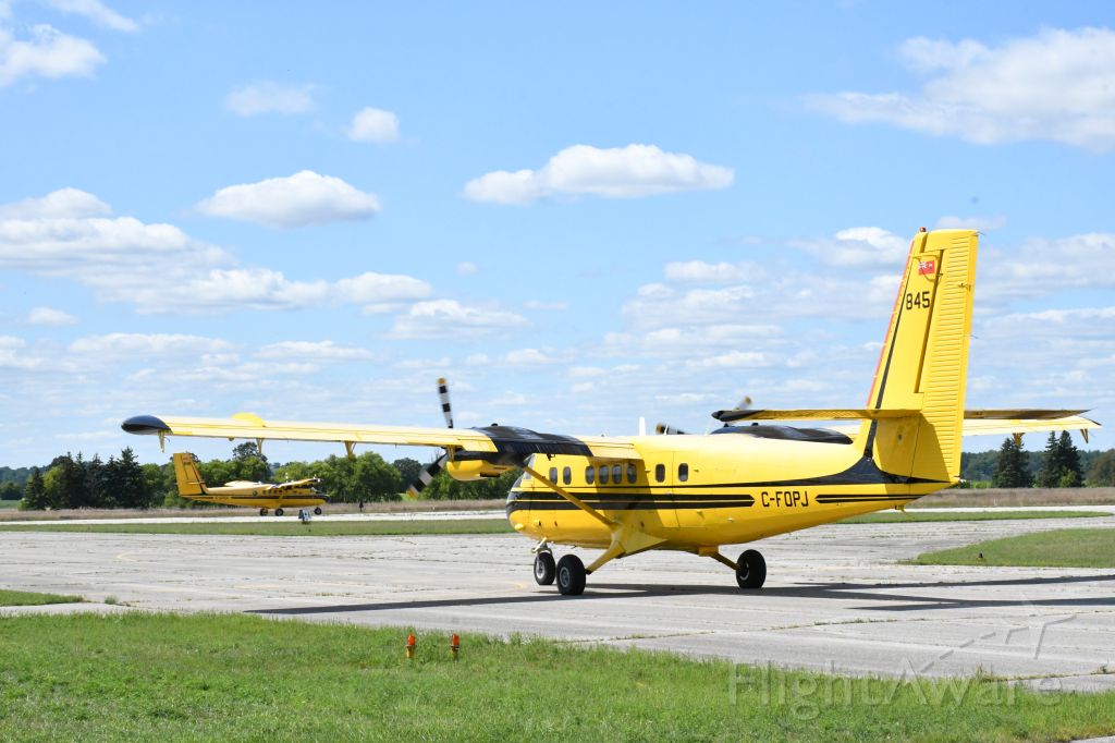 De Havilland Canada Twin Otter (C-FOPJ) - With her sister ship C-GOGC, getting ready for another rabies-vaccine drop around southwestern Ontario.