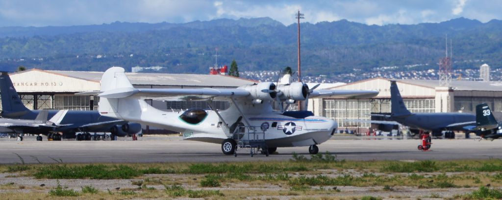N222FT — - A Vultee 28-5ACF sits on the ramp at historic HIckam Air Base with the Waianae Mountains in the background, and KC-135s and a F-35 nearby.  This Catalina was on O'ahu for three weeks, culminating with the 75th Anniversary of VJ Day activities in which it took part.  This plane will be loaded onto the USS Essex and shipped back to the mainland.  The beautiful sound of its distinctive engines will be sorely missed on island.