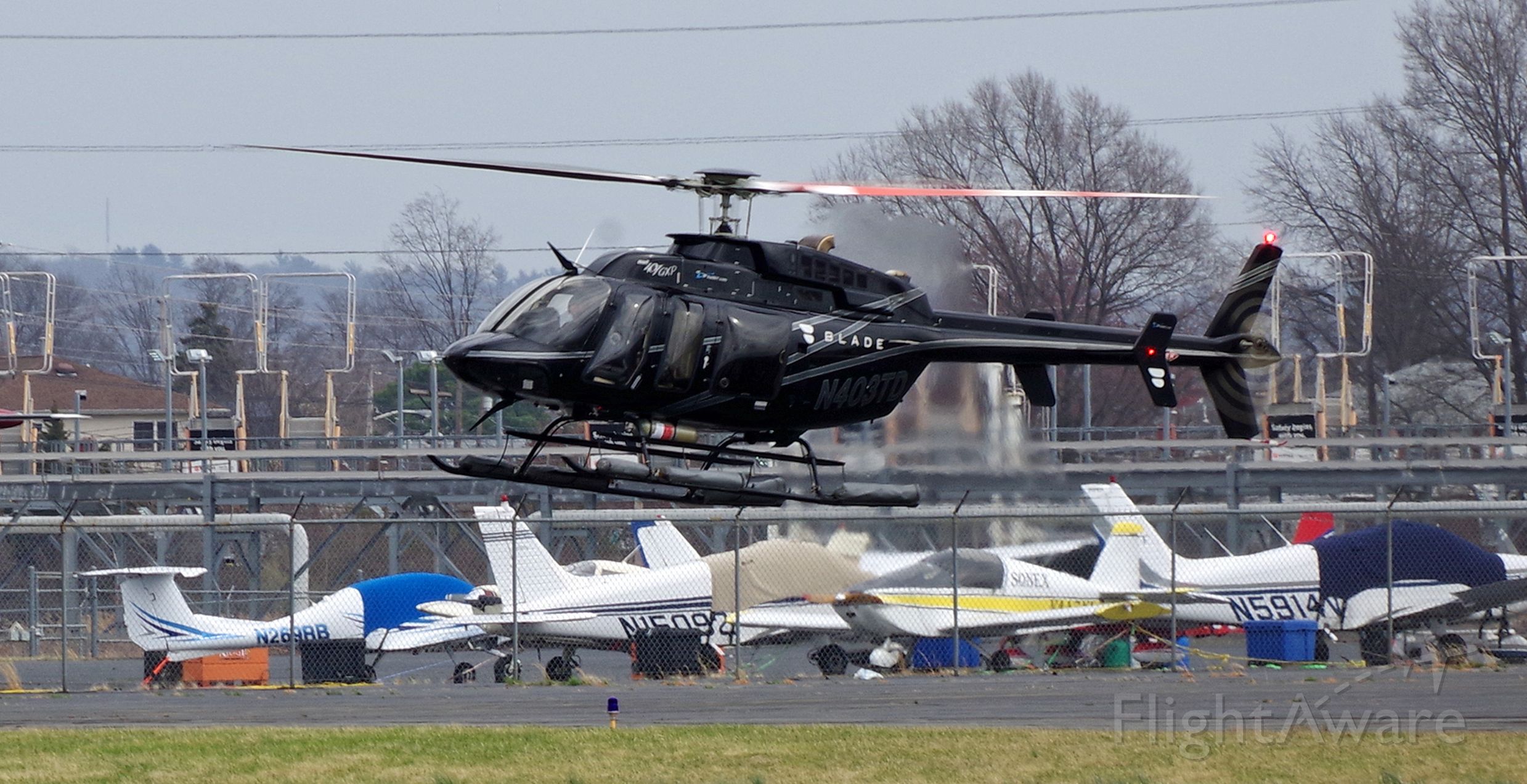 Bell 407 (N403TD) - LINDEN AIRPORT-LINDEN, NEW JERSEY, USA-MARCH 31, 2022: A helicopter operated for the Blade Company is seen by RF at Linden Airport.