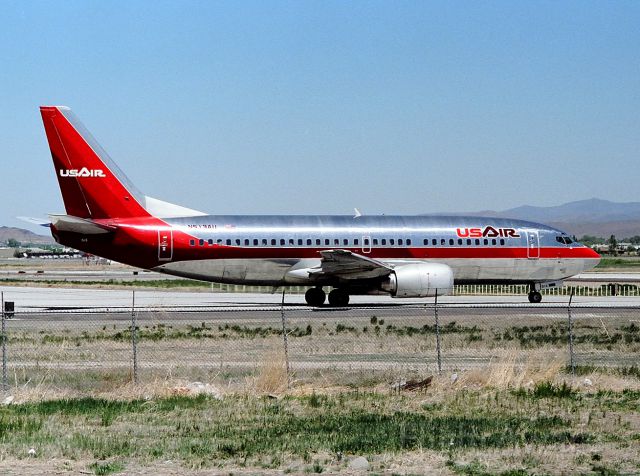 BOEING 737-300 (N513AU) - KRNO - early 1990s view of ill-fated N513AU at the hold bars at Reno.