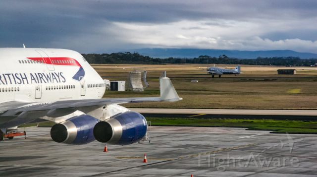 VH-AES — - Old meets new at Melbourne Airport in Australia. Originally built as a Douglas C-47-DL for the US military in 1942, this old girl was sold to Australia in 1944 and now belongs to the Historical Aviation Restoration Society in Australia. Not sure if she's still flying.