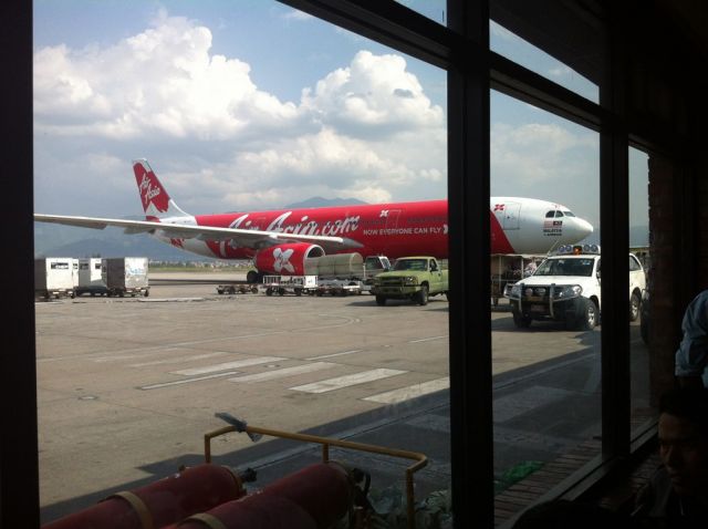 Airbus A330-300 — - Picture taken on 12th May 2015 during 2nd wave of earthquake in Nepal. The airport is closed for about 1 hour. the picture shown AirAsia X plane. Our ride home to Kuala Lumpur, Malaysia.Yeay!