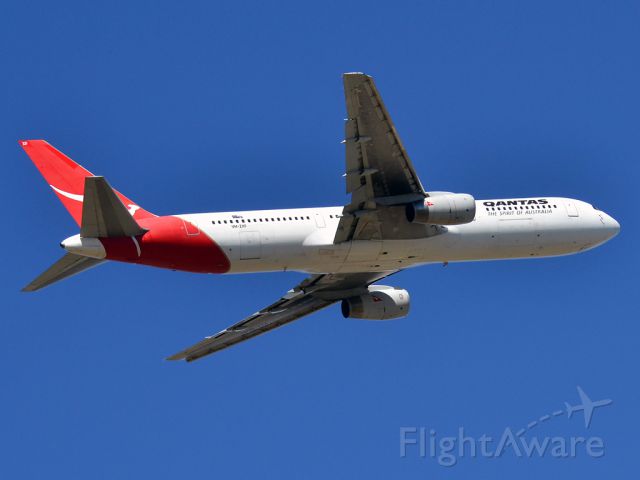 BOEING 767-300 (VH-ZXF) - Getting airborne off runway 23 on this beautiful Adelaide autumn day. Thursday 12th April 2012.