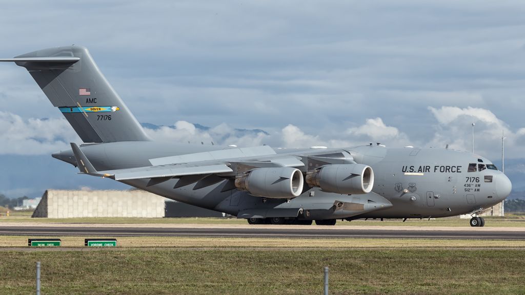 — — - USAF, C17, touches down at RAAF, Townsville, onboard a brand new CHINOOK, CH47 for the Austarlian ARMY.