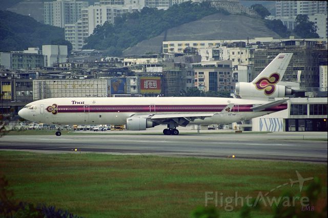 Boeing MD-11 (HS-TMF) - Also good point for taking pictures at Kai Tak very close to runway