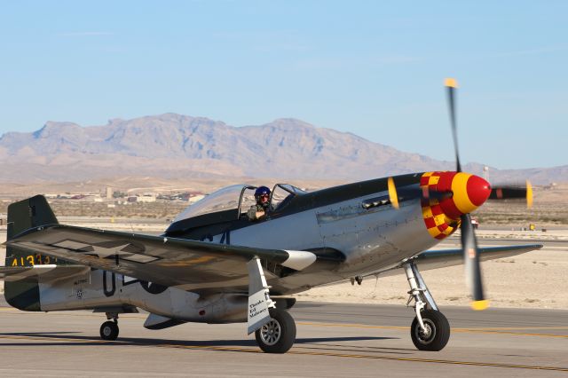 North American P-51 Mustang (NL7715C) - World War 2 era P-51D Mustang taxiing at Nellis AFB with the beautiful Nevada skies in the background.