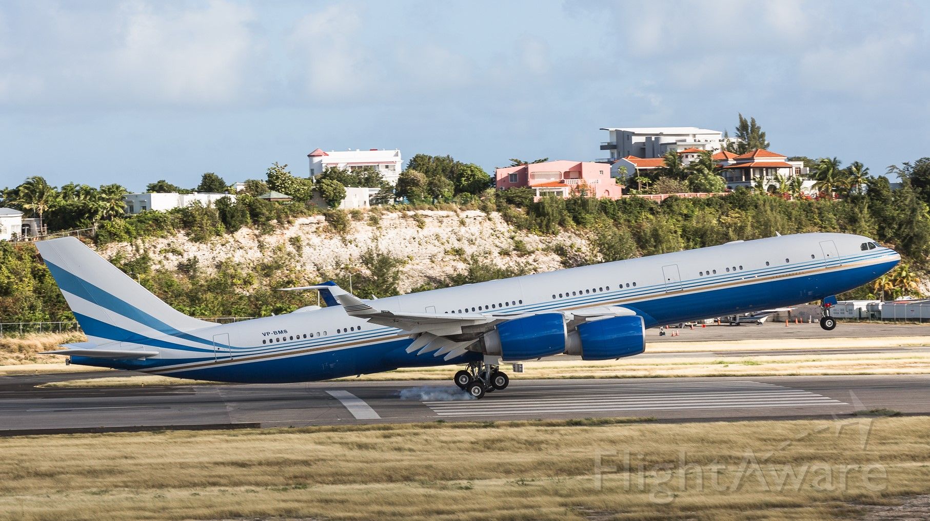 Airbus A340-500 (VP-BMS) - Airbus A340-500 VP-BMS making it look so easy while landing at St Maarten.