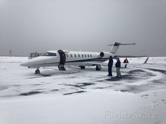 Learjet 45 (N273LP) - Beautiful Lear 45 at KZER on a snowy day heading to KFLL