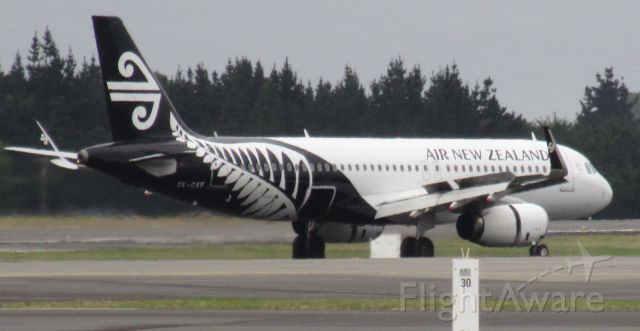 Airbus A320 (ZK-OXF) - This is an Air New Zealand A320 landing on runway 02 at Christchurch Intl Airport.