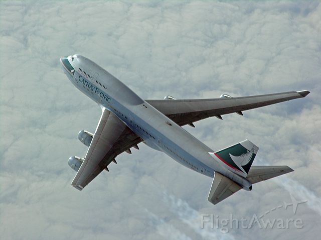 Boeing 747-400 (B-HUA) - 747 en route eastern Pacific FL 370  N52 W164